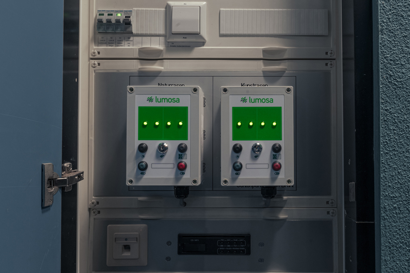 Control cabinet with lighting management system for switching between 257, 160 and 75 lux lighting levels.
